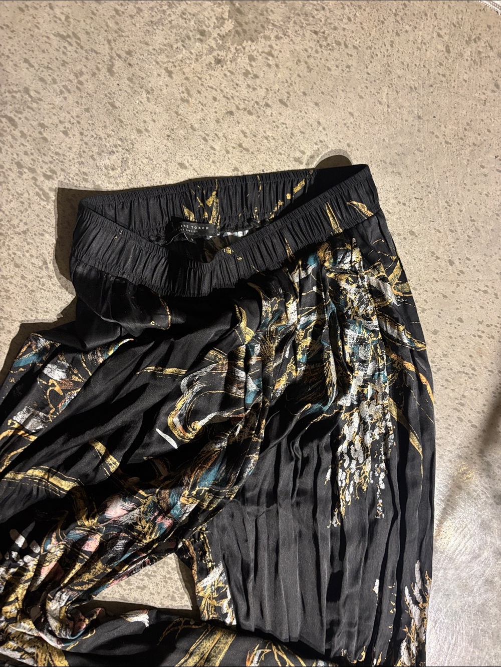 Burning Torch Women’s Black Silk Print Wide-legged Pants